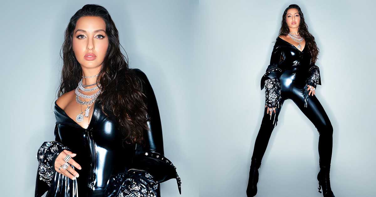 Embrace the Hip-Hop Aesthetic Nora Fatehi's Stunning Black Catsuit by Dead Lotus Couture with Iced Out Accessories discovery blogs