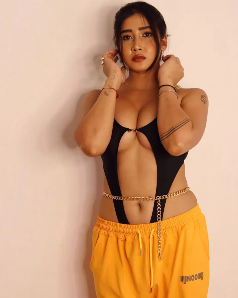 Sofia Ansari in Bold Dress Flaunts Her Body in Yellow and Black Dress