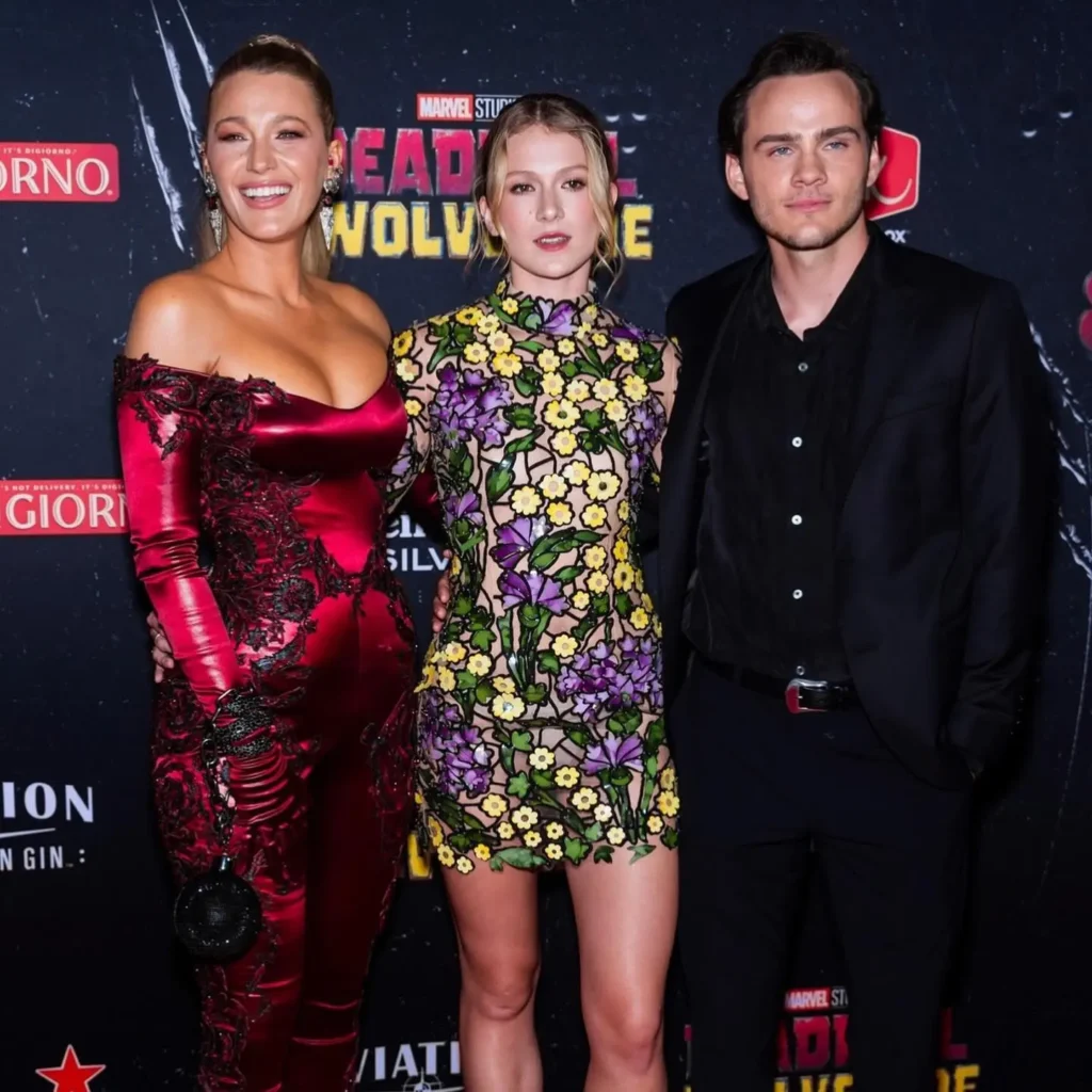 Blake Lively Photos in red satin skin tight dress at deadpool & wolverine event