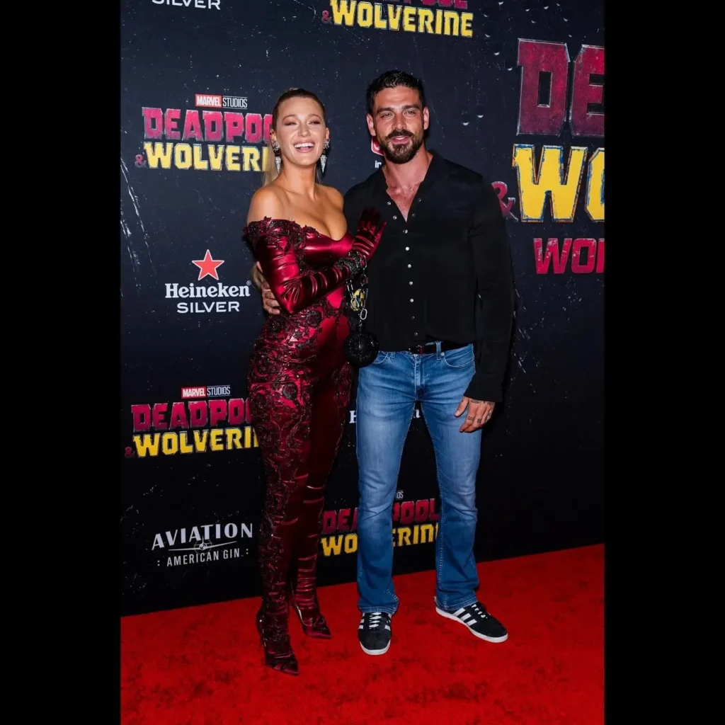 Blake Lively Photos in red satin skin tight dress at deadpool & wolverine event