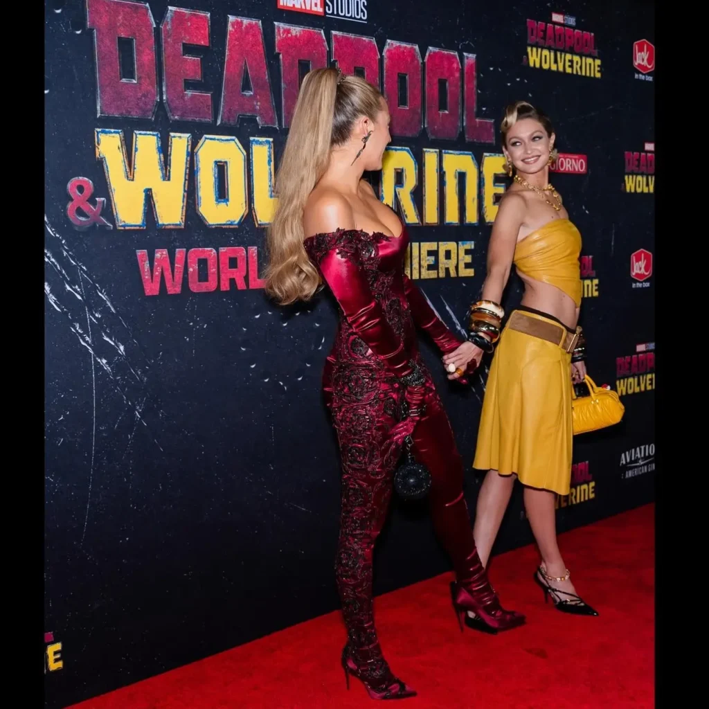 Blake Lively Photos in red satin skin tight dress at deadpool & wolverine event