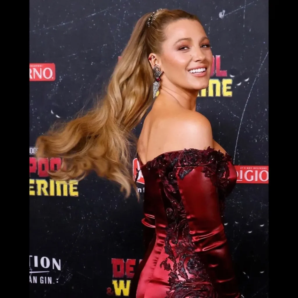 Blake Lively Photos in red satin skin tight dress at deadpool & wolverine event