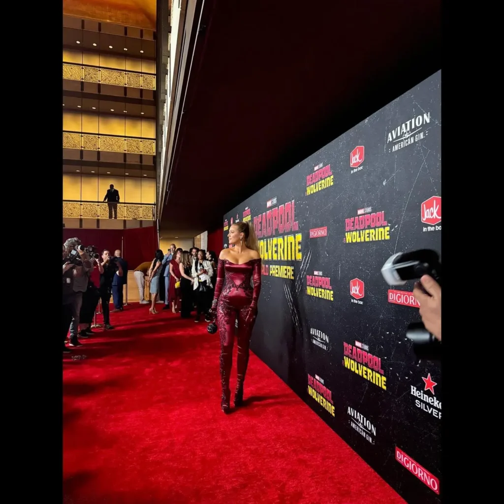 Blake Lively Photos in red satin skin tight dress at deadpool & wolverine event